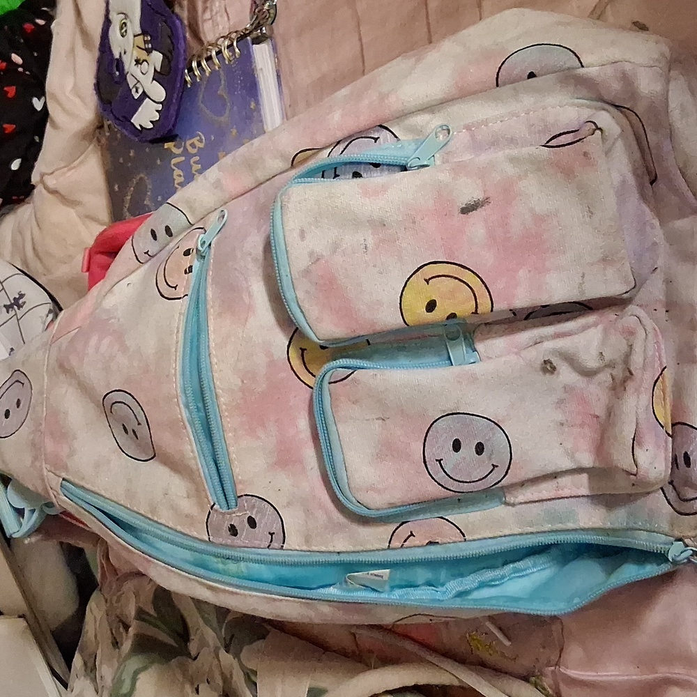 Smiley Face Backpack with Blue Accents
